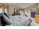 Cozy bedroom features vaulted ceilings, carpet flooring, and a neutral color scheme at 5372 Bay Harbor Dr, Indianapolis, IN 46254