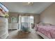 Well-lit Bedroom with a canopy crib, dresser, and daybed at 5372 Bay Harbor Dr, Indianapolis, IN 46254