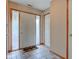 Inviting foyer featuring tile flooring, decorative door, and interior door at 5372 Bay Harbor Dr, Indianapolis, IN 46254