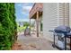 An outdoor patio featuring seating, a grill, and access to the home's exterior at 5372 Bay Harbor Dr, Indianapolis, IN 46254