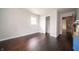 Bedroom featuring hardwood floors and a closet, with a view to the hallway at 5388 W Hazelrigg Rd, Thorntown, IN 46071