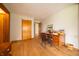 Bright bedroom with hardwood floors, desk, and closet at 5388 W Hazelrigg Rd, Thorntown, IN 46071