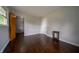 Bedroom with hardwood floors, a closet and view to the hallway at 5388 W Hazelrigg Rd, Thorntown, IN 46071