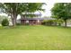 Inviting two-story home features a large front yard and mature trees at 5388 W Hazelrigg Rd, Thorntown, IN 46071