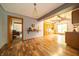The kitchen has warm cabinets and countertops, with an open concept design at 5388 W Hazelrigg Rd, Thorntown, IN 46071