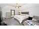 Well-lit bedroom with vaulted ceiling, a ceiling fan, and a comfortable bed at 551 Windward Ln, Plainfield, IN 46168