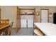 Conveniently located laundry area with bi-fold doors, washer, and dryer at 551 Windward Ln, Plainfield, IN 46168