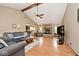 Spacious living room with a fireplace, vaulted ceiling, and comfortable seating arrangement at 551 Windward Ln, Plainfield, IN 46168