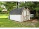 Backyard featuring a barn style storage shed with crossbuck doors at 551 Windward Ln, Plainfield, IN 46168