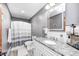 Contemporary bathroom featuring a granite countertop, gray walls and stylish decor at 555 Echo Bend Blvd, Greenwood, IN 46142