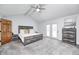 Bright bedroom featuring vaulted ceilings, light blue walls, and french doors to the outside at 555 Echo Bend Blvd, Greenwood, IN 46142