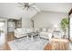 Bright living room showcasing a comfortable sectional sofa, area rug, and natural light at 555 Echo Bend Blvd, Greenwood, IN 46142