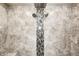 Close up of a modern shower featuring tile walls, multiple shower heads, and overhead lighting at 555 Echo Bend Blvd, Greenwood, IN 46142