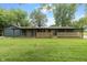 Sprawling backyard with covered porch and wooden features perfect for entertaining at 6348 W 750 N, McCordsville, IN 46055
