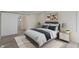 A bedroom featuring decor, soft neutral carpet, and natural light coming from the bathroom entrance at 6348 W 750 N, McCordsville, IN 46055