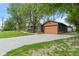 Quaint home with mature trees, long drive, and updated exterior elements at 6348 W 750 N, McCordsville, IN 46055
