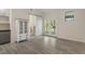 Bright room with French doors to the backyard and a cabinet with granite counter at 6348 W 750 N, McCordsville, IN 46055