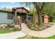 Charming home with a covered porch, mature landscaping, and attached garage at 6348 W 750 N, McCordsville, IN 46055