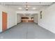 Large garage with bright lighting, clean floor, and room for storage or a workshop at 6348 W 750 N, McCordsville, IN 46055