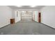 Spacious garage with built-in shelving and bright lighting at 6348 W 750 N, McCordsville, IN 46055