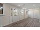 Inviting entryway with decorative glass door and windows, featuring recessed lighting and light wood flooring at 6348 W 750 N, McCordsville, IN 46055