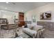 Living room shows a sofa, stone accents, and access to a lower level at 6348 W 750 N, McCordsville, IN 46055