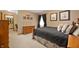Comfortable bedroom with a wooden dresser, and walk-in closet at 6575 Robin Hood Dr, Indianapolis, IN 46227