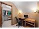 Home office features desk, walk-in closet, chair, and natural light at 6575 Robin Hood Dr, Indianapolis, IN 46227