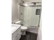 Bathroom features tiled shower-tub, modern fixtures, and sleek design at 6604 Heritage Hill Dr, Indianapolis, IN 46237