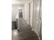 Second floor hallway leads to a laundry room featuring new, side-by-side washer and dryer appliances at 6604 Heritage Hill Dr, Indianapolis, IN 46237