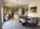 Spacious kitchen with wood cabinets, stainless steel appliances, and an island with countertop seating at 6604 Heritage Hill Dr, Indianapolis, IN 46237
