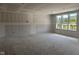 Open concept living room featuring large bright windows at 7242 Barrett Dr, Brownsburg, IN 46112
