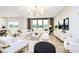 Spacious living room with large windows, comfortable seating, and modern decor at 7242 Barrett Dr, Brownsburg, IN 46112