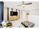 Stylish loft space featuring a large television, a chess set, comfortable chairs and plenty of room for relaxation at 7242 Barrett Dr, Brownsburg, IN 46112