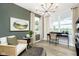 Stylish home office featuring a modern desk, comfortable chair, and ample natural light at 7242 Barrett Dr, Brownsburg, IN 46112