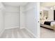 Spacious walk-in closet with ample shelving and carpeted floor, ready for personalized organization at 7242 Barrett Dr, Brownsburg, IN 46112