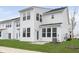 Exterior view of a home's backyard with an AC unit and manicured lawn at 7318 Shroyer Way, Noblesville, IN 46062