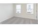Neutral bedroom with two windows providing plenty of natural light at 7318 Shroyer Way, Noblesville, IN 46062