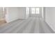 Bedroom with large windows offers natural light, neutral carpet and white walls at 7318 Shroyer Way, Noblesville, IN 46062
