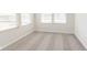 Sun-filled bedroom with double windows, neutral carpet, and white trim at 7318 Shroyer Way, Noblesville, IN 46062