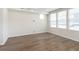 Bright living room with a window and neutral wall paint at 7318 Shroyer Way, Noblesville, IN 46062