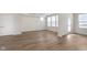 Spacious living room with a door to the backyard at 7318 Shroyer Way, Noblesville, IN 46062