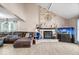 Cozy living room features a brick fireplace, and an aquarium at 7345 Monon Cir, Indianapolis, IN 46256