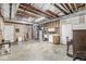 Spacious unfinished basement with utilities, concrete floors, and ample potential for customization at 7421 Meadow Violet Ct, Avon, IN 46123