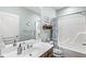Clean bathroom featuring a shower-tub combo and vanity with sink at 7421 Meadow Violet Ct, Avon, IN 46123