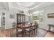Beautiful dining room with a large window and elegant furniture at 7421 Meadow Violet Ct, Avon, IN 46123