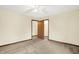 Bedroom featuring neutral walls, carpet flooring, and closet at 7840 Park Ward Pl, Indianapolis, IN 46259