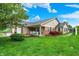 Charming single-story home with a well-manicured lawn, brick accents, and inviting curb appeal at 7840 Park Ward Pl, Indianapolis, IN 46259