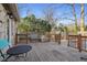 Wooden back deck with a table and bench for outdoor seating at 7910 Teel Way, Indianapolis, IN 46256