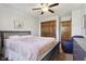 Bedroom with a bed and closet, offering comfort and ample storage space at 7910 Teel Way, Indianapolis, IN 46256
